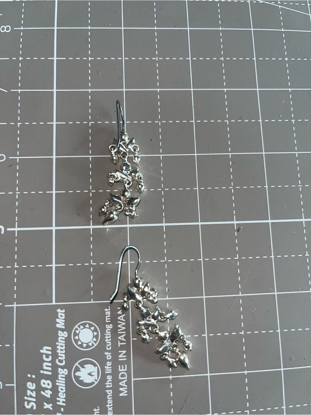 Dangling drop rhinestone earrings silver tone